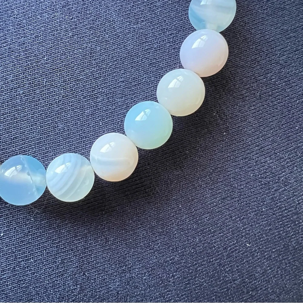 T Jazelle blue aquamarine bracelet with wave charm